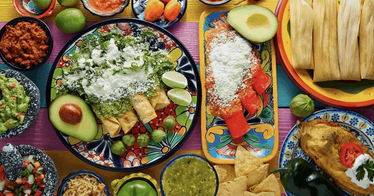 A delightful assortment of global dishes on a rustic wooden table A delightful assortment of global dishes on a rustic wooden table